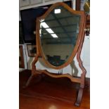 A reproduction shield shaped dressing table mirror