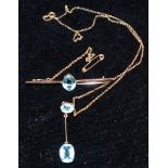 A negligée necklace and bar brooch set with aquamarine coloured stones, stamped '9CT', 7.5 gm