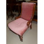 A Victorian mahogany nursing chair in pink; a Victorian dining chair