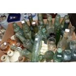 A selection of Manchester related moulded glass bottles, 19th century or later; a few stoneware