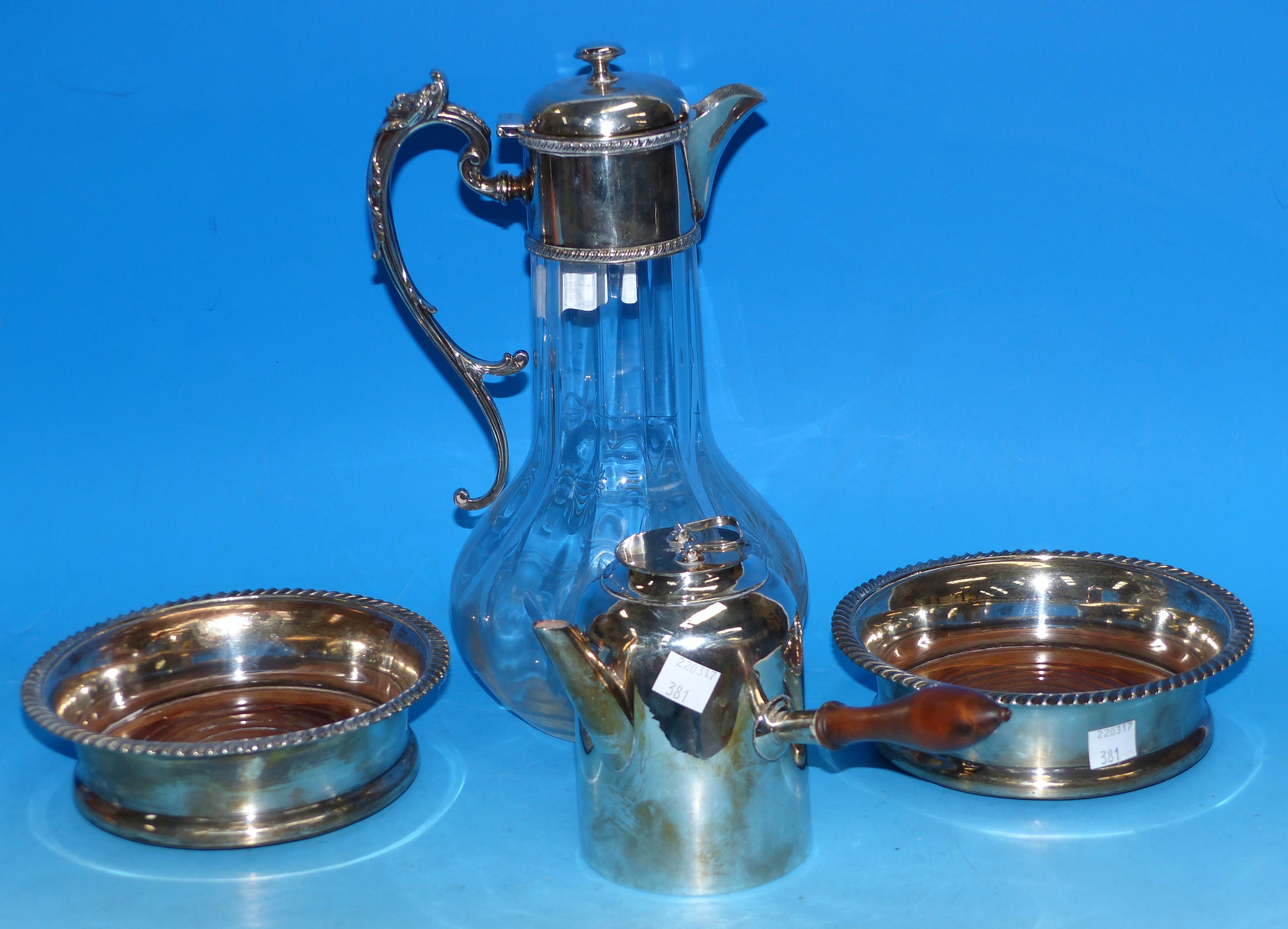 A claret jug with silver plated rim and handle; a late 18th/early 19th century plated chocolate pot;
