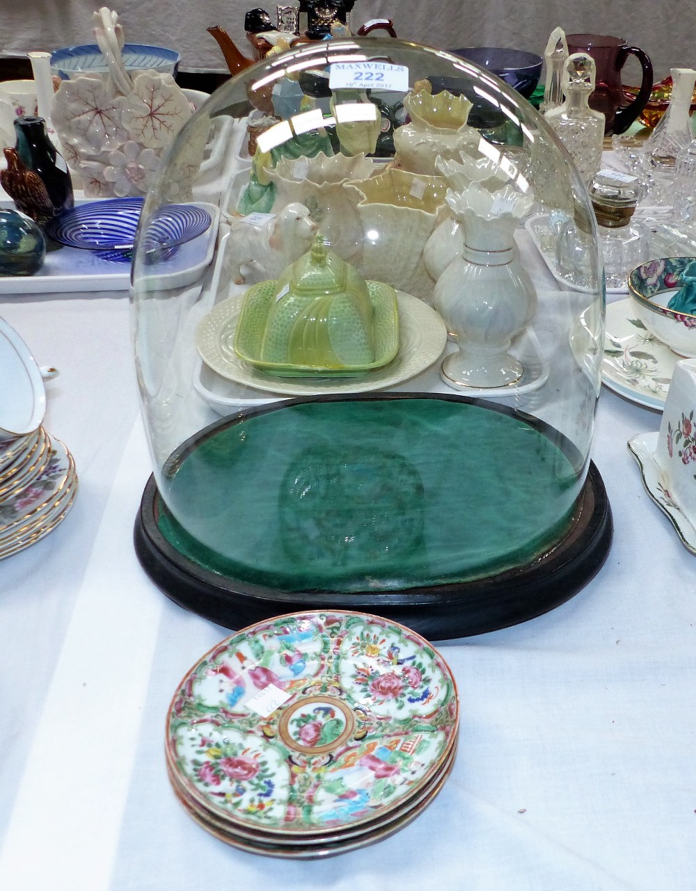 A Victorian glass dome on ebonised plinth; 3 19th century Chinese famille verte saucers