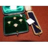 A Victorian opal set stick pin; a selection of studs etc.