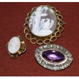 A 19th century classically inspired cameo brooch; a similar smaller brooch; a late Georgian paste