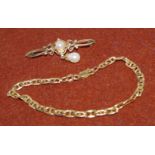 A 9 carat pearl set bar brooch; a bracelet stamped '9K', 5.6 gm