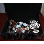 A marbled glass jewellery box and a selection of costume jewellery