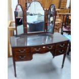 A Georgian style inlaid mahogany 'D' front kneehole dressing table of 5 drawers, with similar