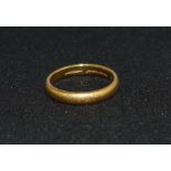 A 22 carat hallmarked gold wedding ring