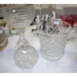 A large cut crystal ice pail; a covered vase; a pedestal bowl