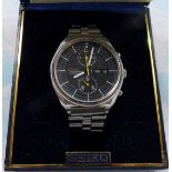 A Seiko Chronograph Automatic with steel strap