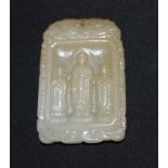 A Chinese jade pendant/plaque carved in relief with a female deity, possibly Guan Yin, and 2