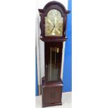 A reproduction mahogany longcase clock with triple weight chiming movement