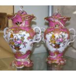 A pair of Rockingham style covered mantel urns, floral and gilt decoration on pink ground, 11½" (1