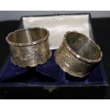 A pair of silver engraved napkin rings, Birmingham 1899