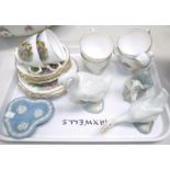 A Vale Royal 18 piece tea set with country cottages; a Lladro boy with lamb; 2 Nao geese; a Wedgwood