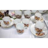 A set of 6 GV Coronation commemorative teacups and saucers; a pair of similar beakers