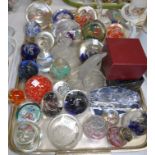 A selection of modern decorative paperweights and glassware