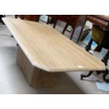 A polished limestone rectangular coffee table