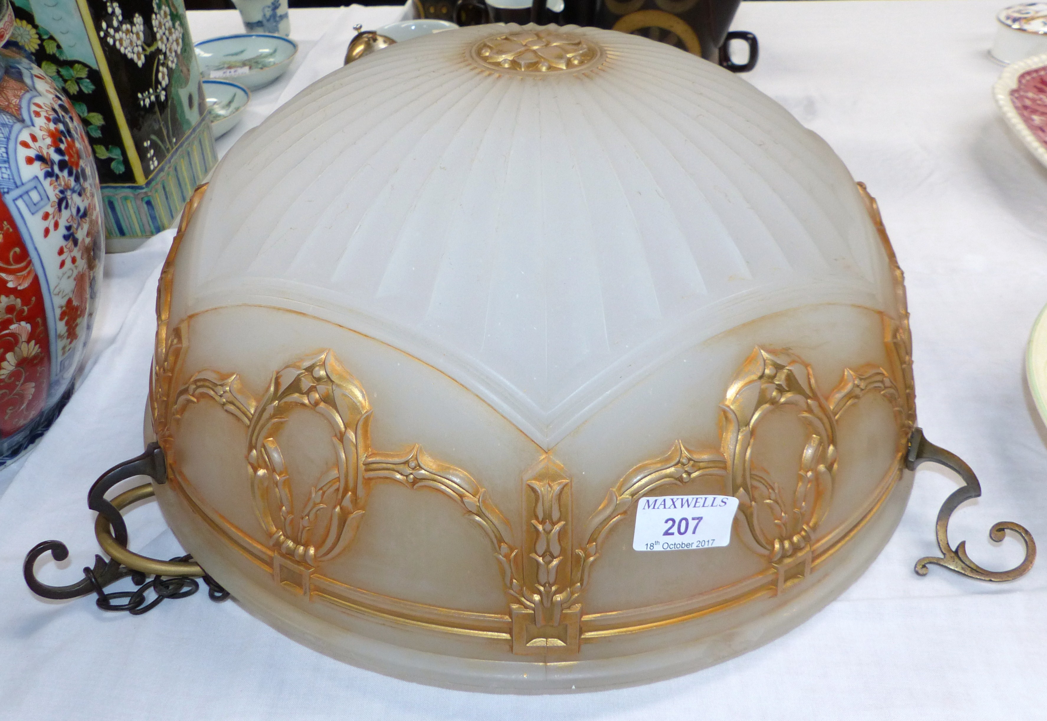 An Edwardian large opaque glass light bowl with raised gilt decoration and original fittings