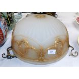An Edwardian large opaque glass light bowl with raised gilt decoration and original fittings