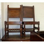 An 18th century oak panel back chair with pyramid finials; a similar chair