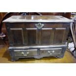 An 18th century "Coffer Back"/mule chest with hinged lid, 4 raised panels to the front and 2 doors