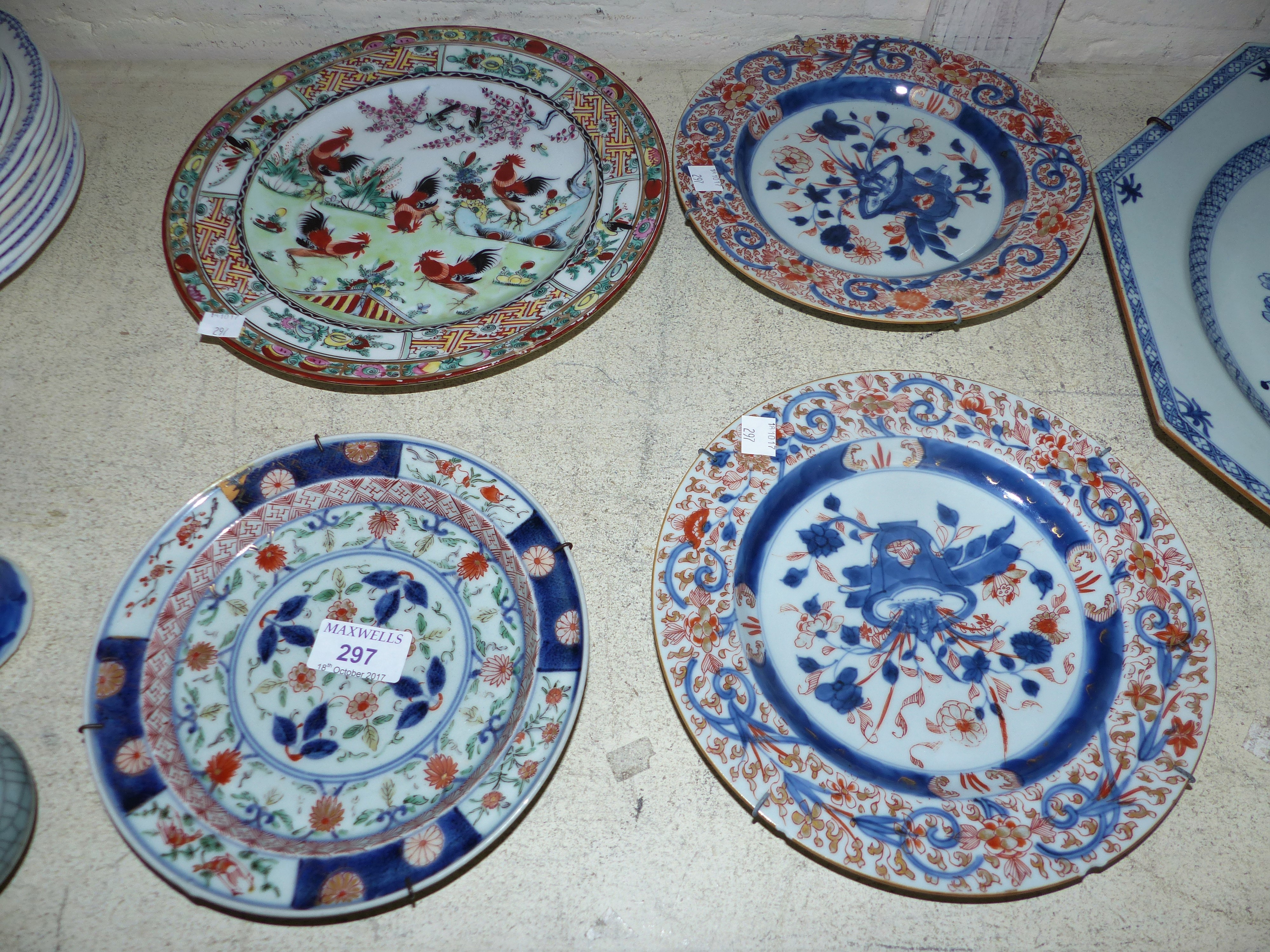 A pair of small Imari wall plaques, diameter 8½"; a similar smaller wall plaque with 4 character