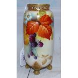 A Royal Worcester vase with pierced neck and scroll feet, decorated with blackberries, signed K
