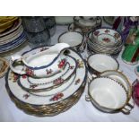 A Booth's colour transfer dinner service, fruit pattern with blue/gilt border; a Japanese tea set;