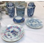 An oriental blue and white lidded candle holder (hairline crack), 2 Chinese plates (all some damage)