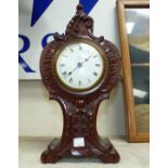 A rococo style mantel clock with French 8 day movement