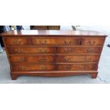 A mahogany sideboard with 9 drawers