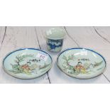 A pair of Chinese shallow dishes with polychrome decoration of women in gardens, diameter 5½" (chips