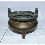 A Chinese bronze incense burner with silver inlay in geometric patterns, on 3 raised feet, 2