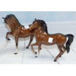 Two Beswick bay horses