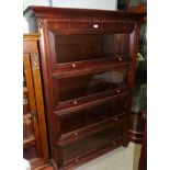 An Ethan Allen mahogany 4 height library bookcase with shelves enclosed by glazed up and over doors,