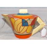 A Clarice Cliff Melon pattern teapot with associated cover, length 9"