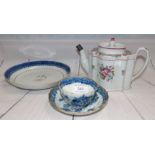 A First Period Worcester cup and saucer set decorated in blue and gilt; a similar early English