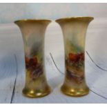 A pair of Royal Worcester waisted cylindrical vases decorated with highland cattle, signed H