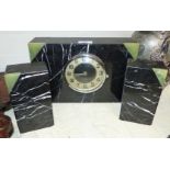 An Art Deco black marble 3 piece clock garniture