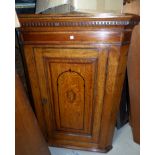 An 18th century oak straight front corner cupboard with shell inlay, Tunbridge frieze; etc.