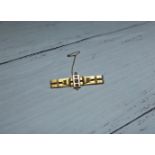 A 9 carat hallmarked gold strap bar brooch, diamond set, 4.2 gm