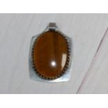 A Sidney Beddall silver pendant set large oval tiger's eye stone, 5 mm