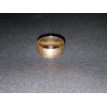 A 9 carat hallmarked gold wedding ring, 6.7 gm