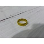 A 22 carat wedding ring, 7.6 gm