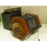 A Lachenal 21 button concertina in mahogany, with wooden case