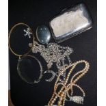 A silver locket on chain; an enamel brooch; bangles; a cigarette case; etc.