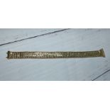 A yellow metal strap chain bracelet, marked 'ITALY 375', 10.5 gm