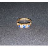 A Victorian style 18 carat 5 stone diamond and sapphire ring, 2.5 gm