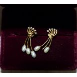 A pair of yellow metal wire earrings set river pearls and tiny diamonds stamped '18k' 4gms